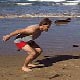 double leg bounding at the beach